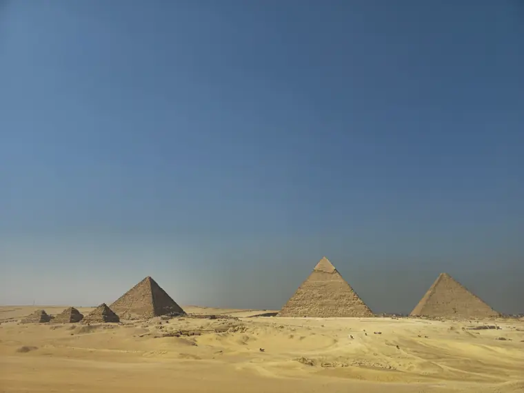The pyramids of Giza across the desert