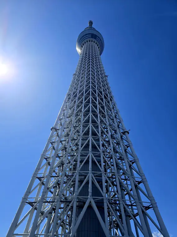 Lattice tower against a deep blue sky